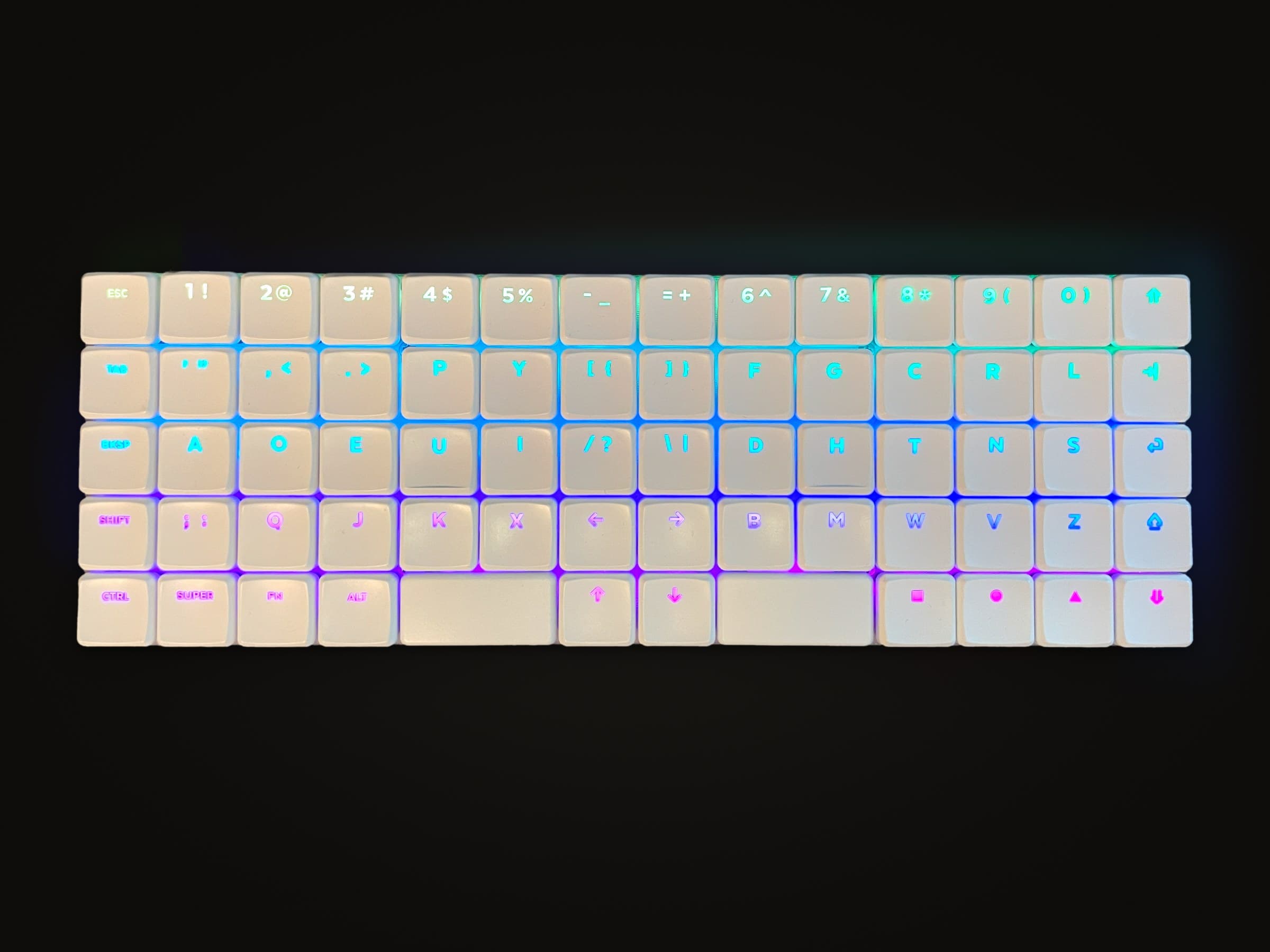 KeBe v1 in white from above, 68 keys in straight columns lit from underneath.